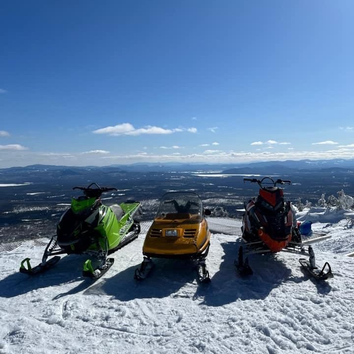Snowmobiling Cozy Cove Cabins