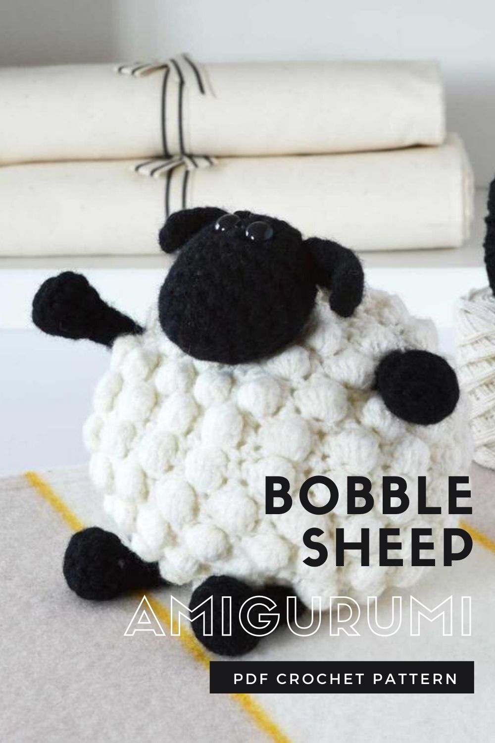 Adorable Bobble Sheep Crochet Amigurumi Pattern. Love this cozy looking sheep! It could almost be a throw pillow on a bed! So cute! #crochetpattern #amigurmipattern #crochetsheeppattern #diytoys #crochettoypattern #craftevangelist