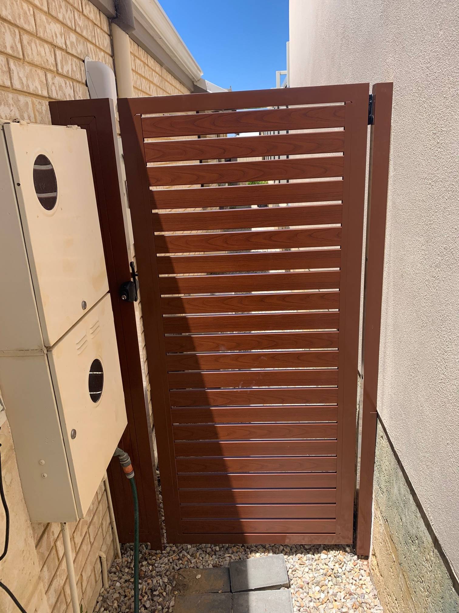 Woodgrain Slat Gate in Clarkson — Craftsman Fencing Perth