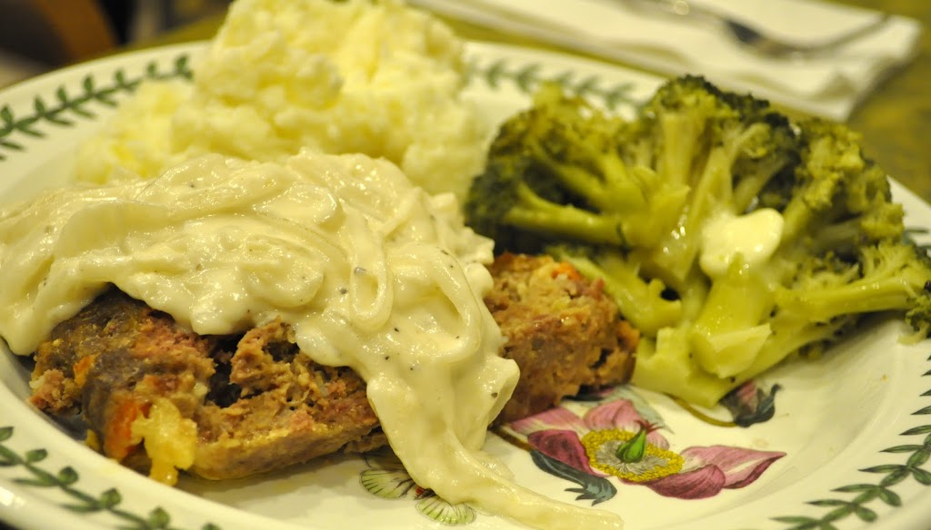 Meat Loaf with Creamy Onion Gravy, Mashed Potatoes, and Steamed