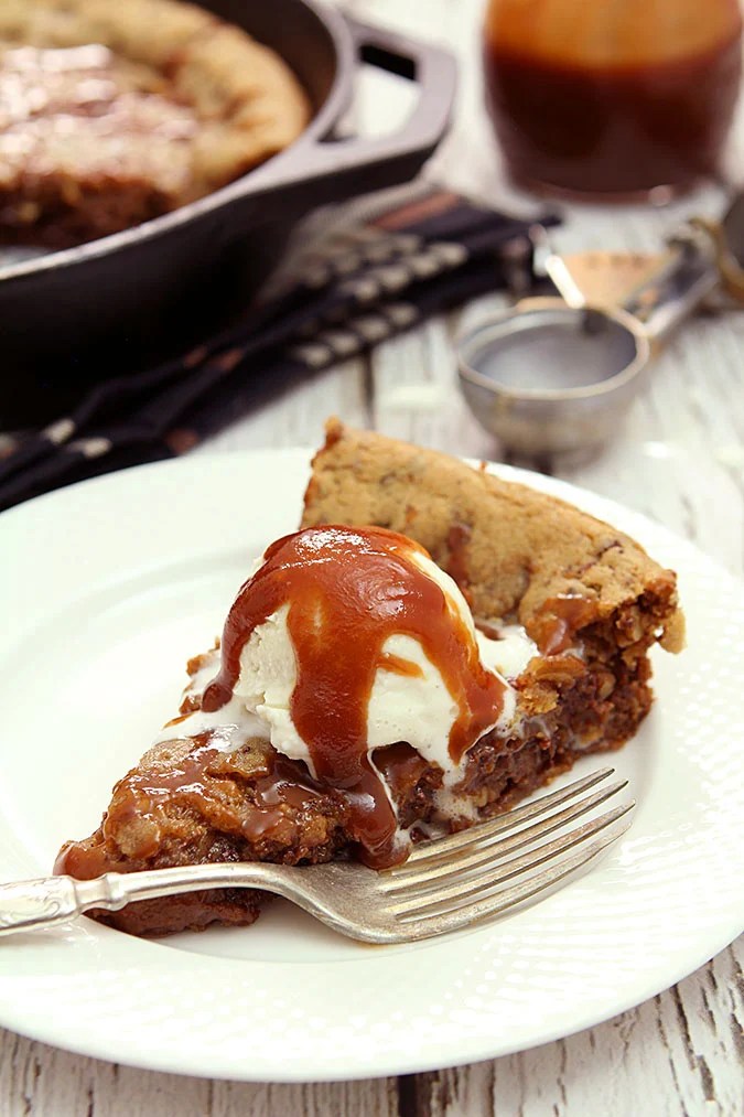 Chocolate Chip Skillet Cookie with Pecans & Bourbon Caramel Sauce