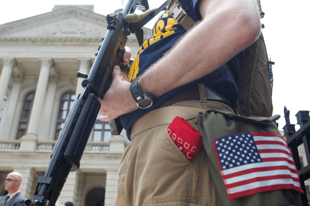 NEWS BRIEF Gun rights extremist challenges Zoo Atlanta weapons ban