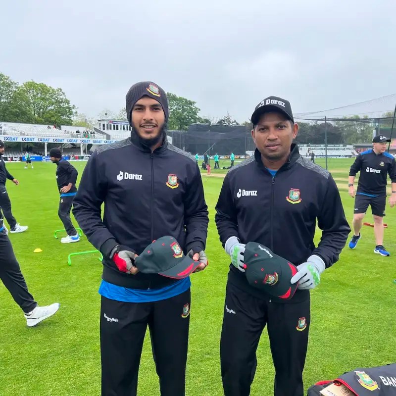 ebadot hossain cricketer with friend in field