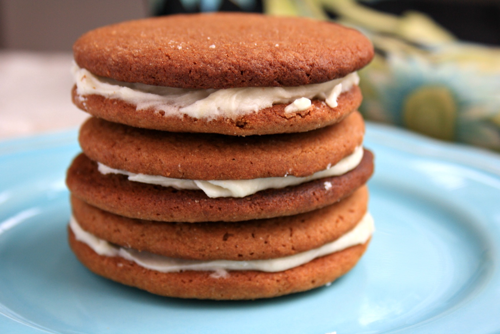 Buttery brown sugar molasses cookies sandwiched with creamy icing