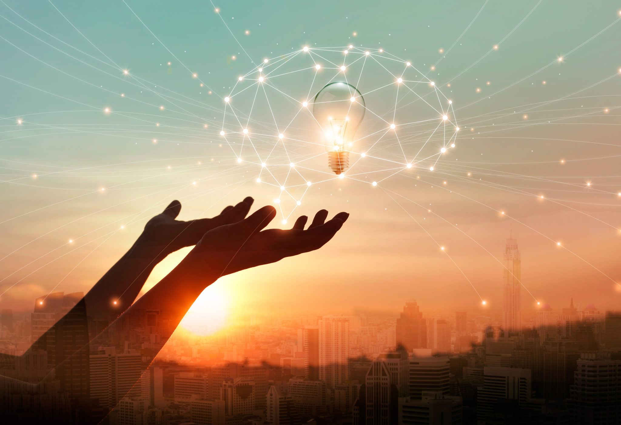 Abstract science. Hand holding brain digital network and light bulb