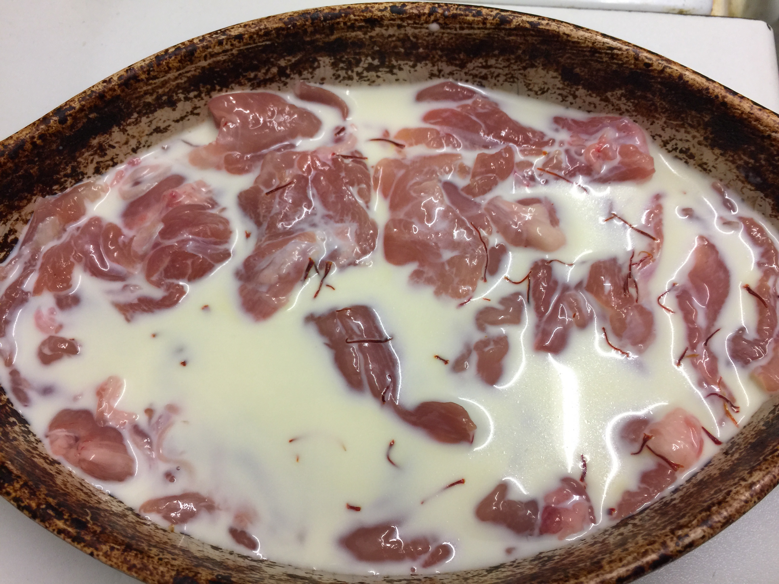 Saffron Poached Chicken with Roasted Onion and Cumin Hummus Culinary