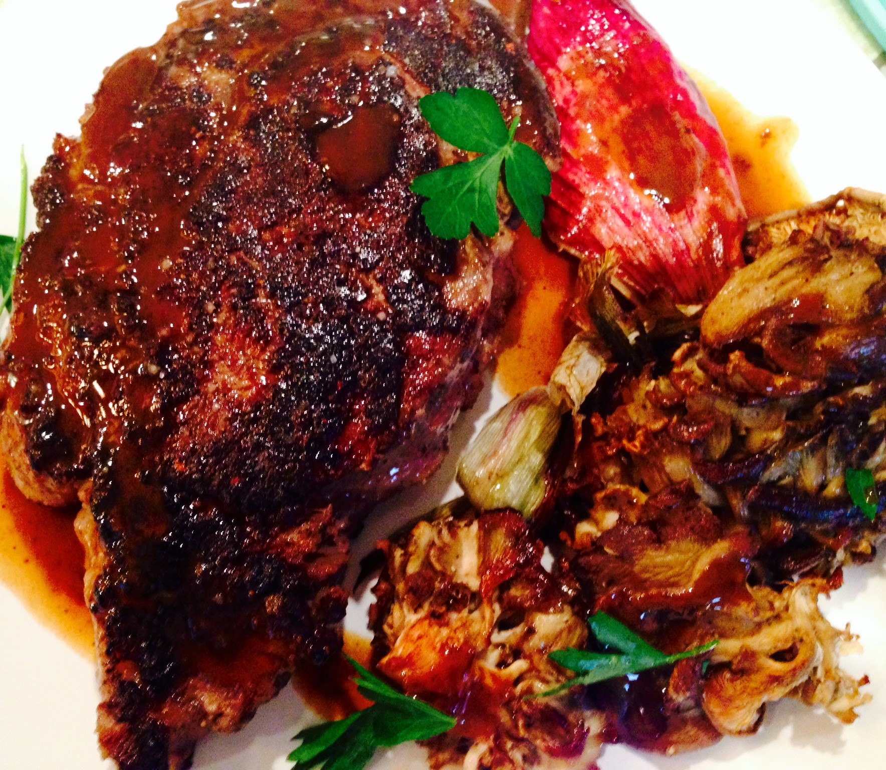 Porcini Rubbed Ribeye with Veal Cognac Jus and Roasted Mushrooms and