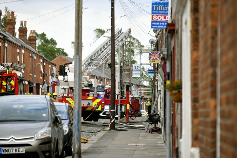 Fire crews tackle blaze involving five terraced Carlisle homes
