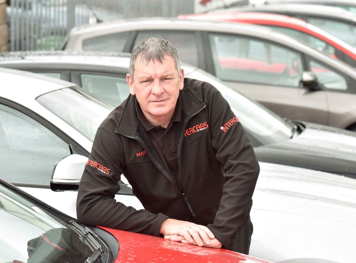 Car dealers feel the squeeze as worldwide shortage hits industry