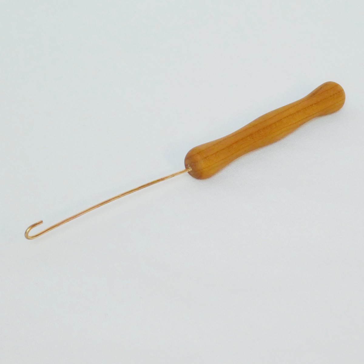 Orifice Hook, Cherry Cynthia Wood Spinner