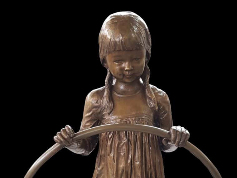 Woman arrested over ‘girl with the hula hoop’ bronze statue theft
