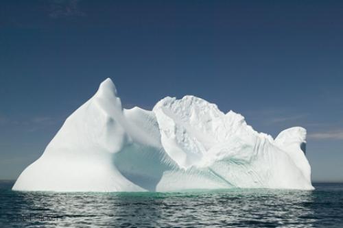 Classical Mechanics Problem Iceberg floating in the ocean A Former