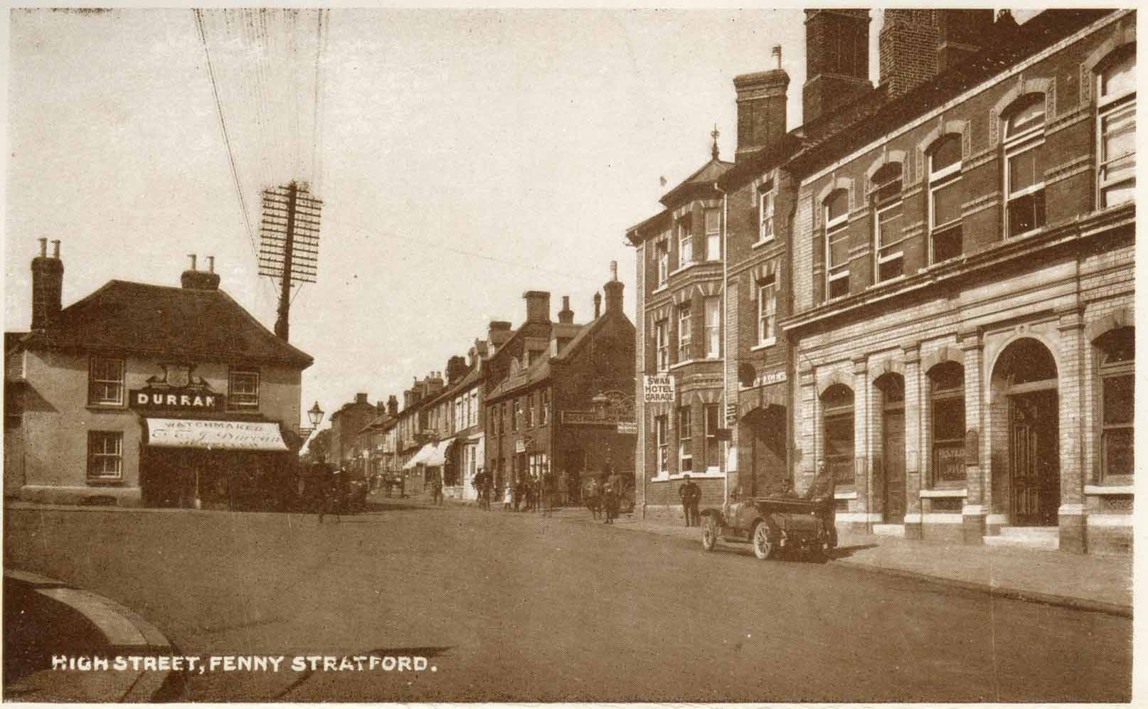 High Street Fenny Stratford showing Durran's optician, and Swan Hotel