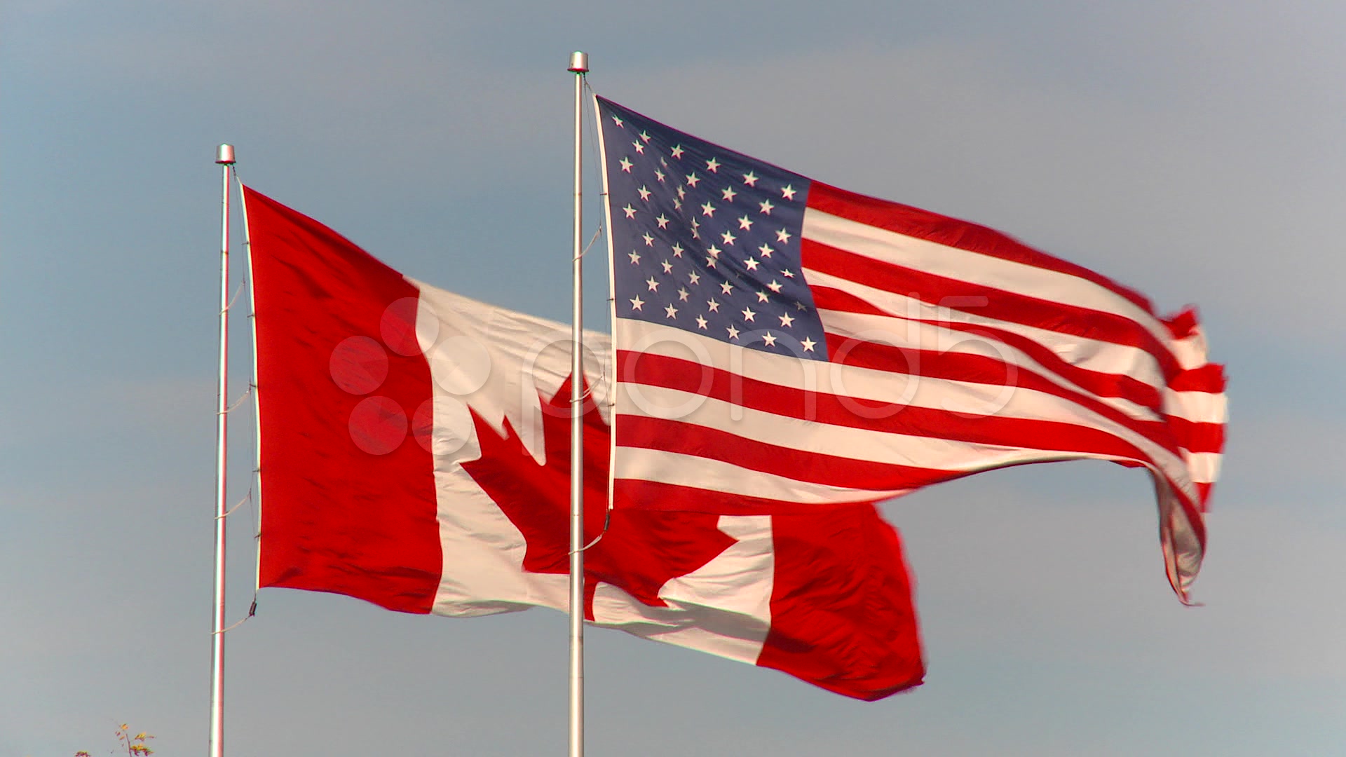 Flag, huge US and Canada flags, neighbors together Hi Res 926801