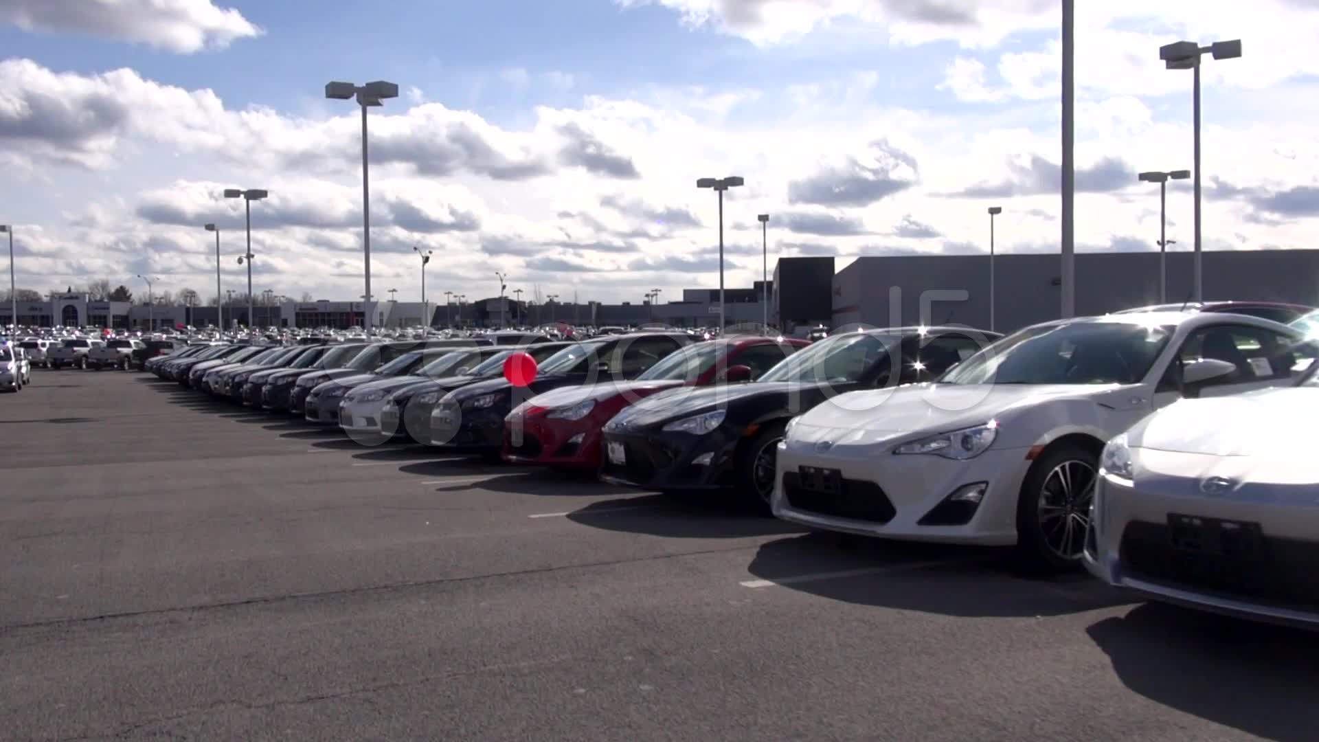 New Cars at Auto Dealership, in Parking Lot Video 022668725