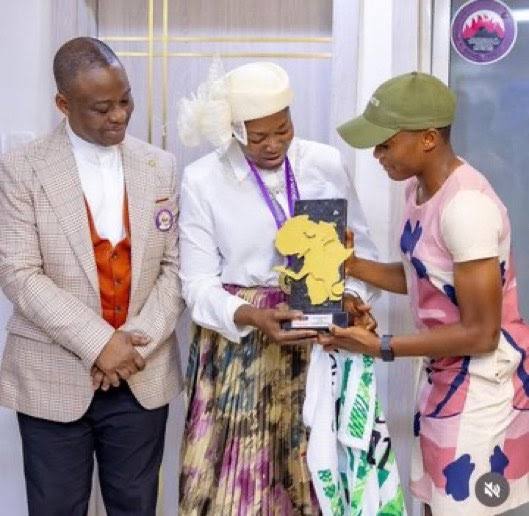 Super Falcons captain Ajibade presents WAFCON medals to Pastor Olukoya, wife