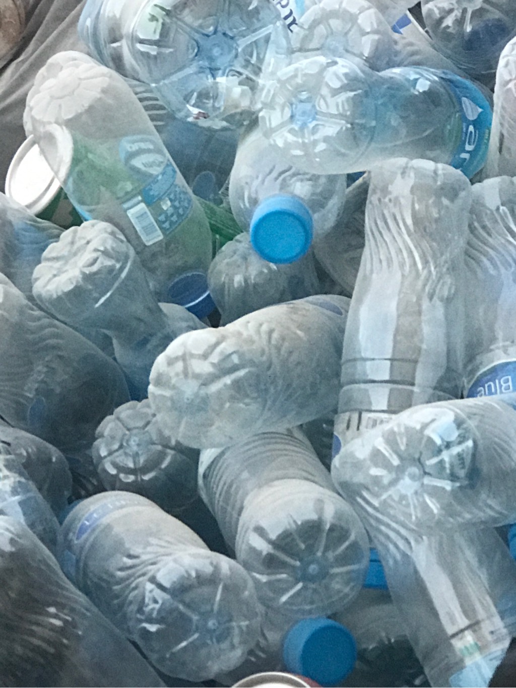 HDPE , Mixed recycled, plastic water bottles