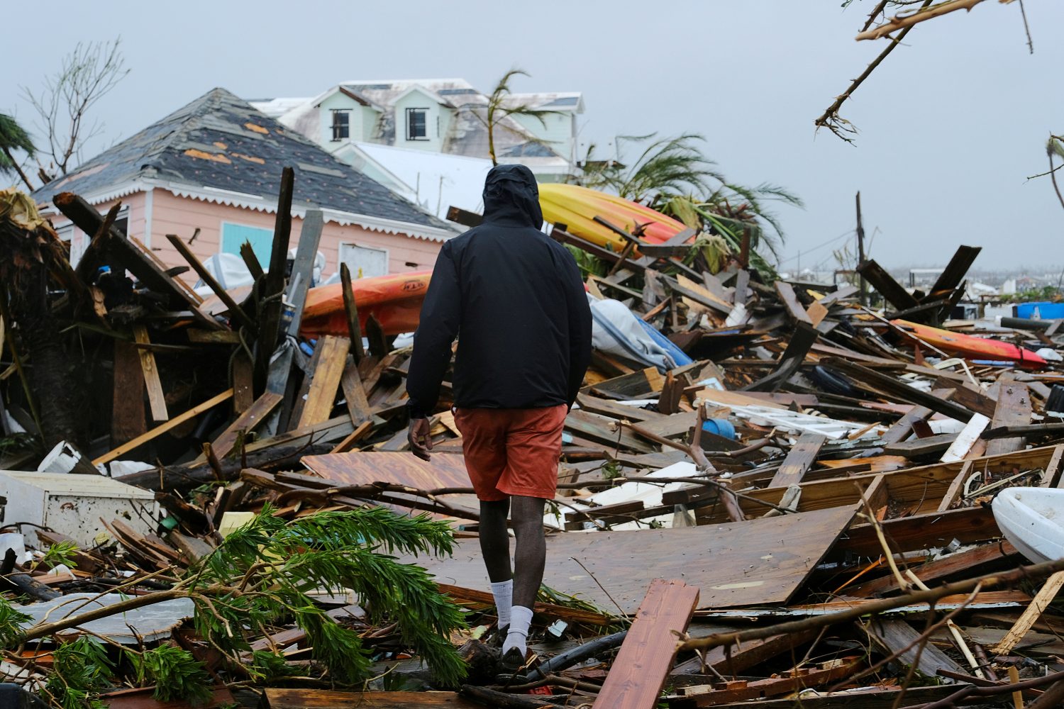 Bahamas hurricane survivors tell of children swept away; death toll