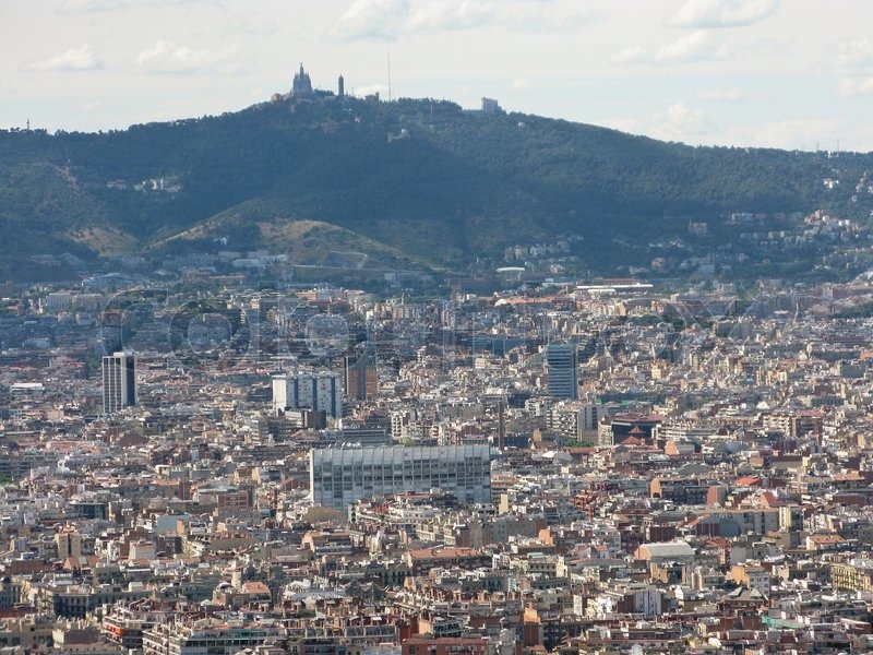 View on the city of Barcelona in Spain with mountains in the background