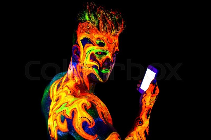 Fire, Body art glowing in ultraviolet Stock image