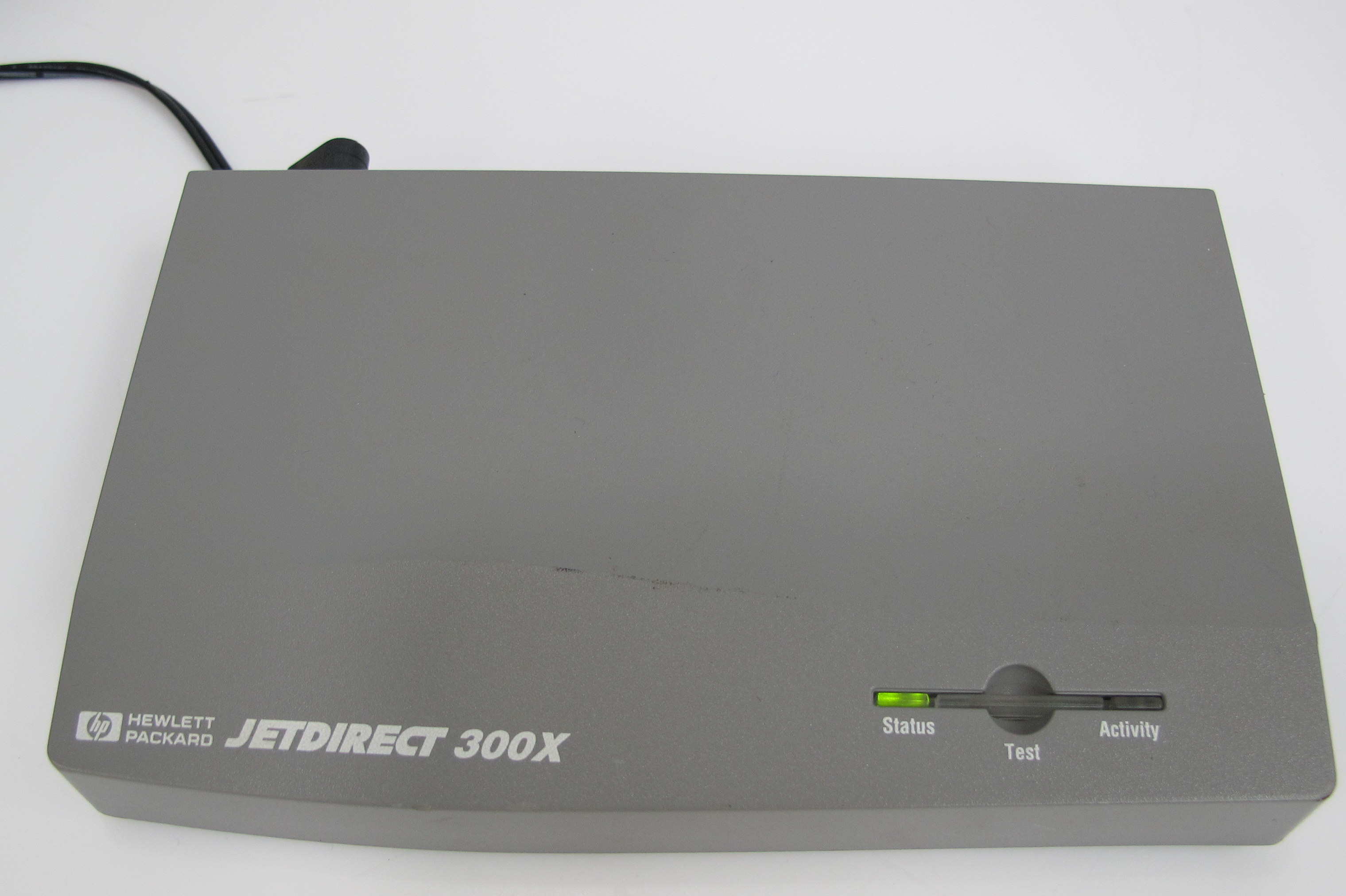 Hewlett Packard JetDirect 300X Print Server - Servers and Switches