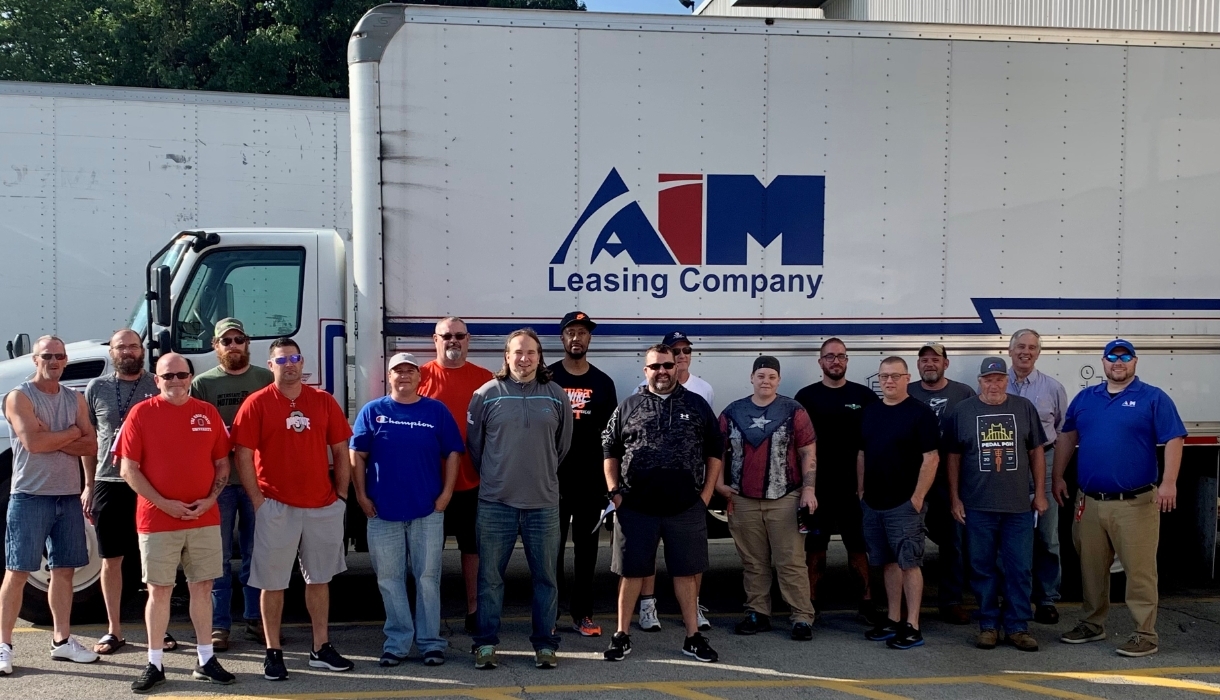 Aim Transportation Solutions Mission, Benefits, and Work Culture