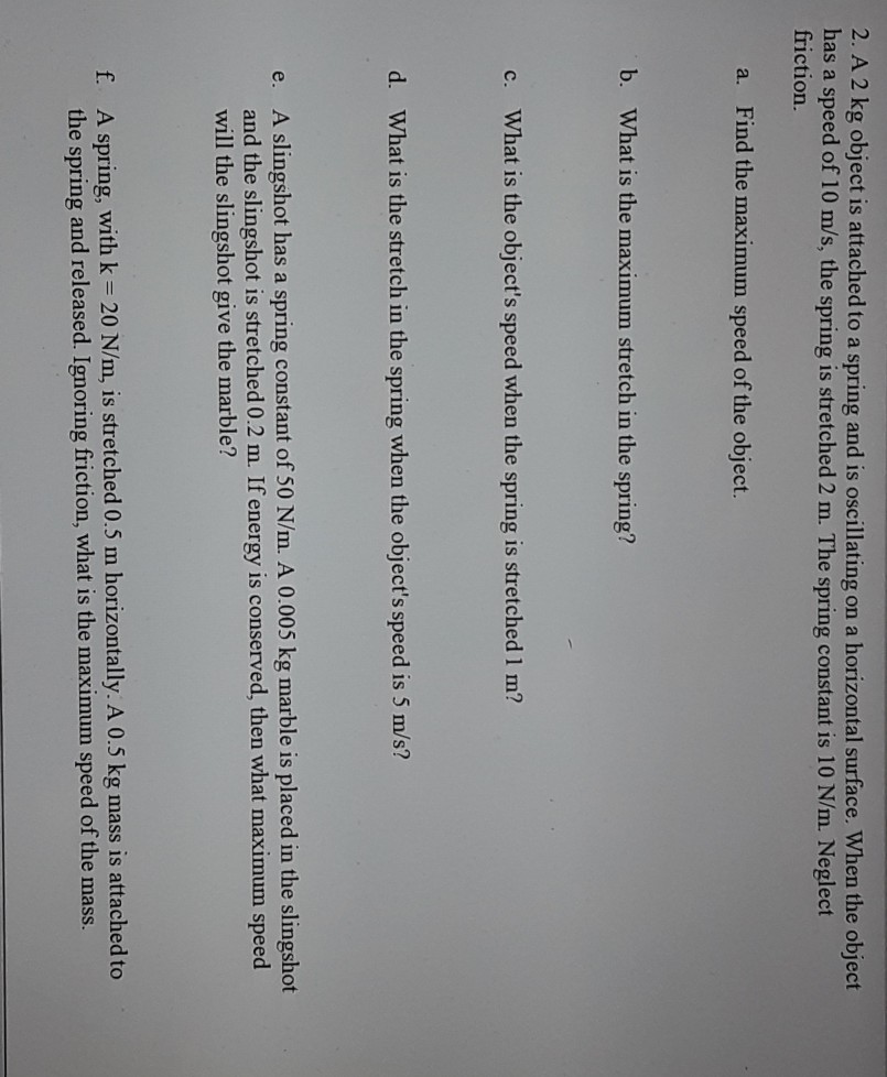 Solved 2. A 2 kg object is attached to a spring and is