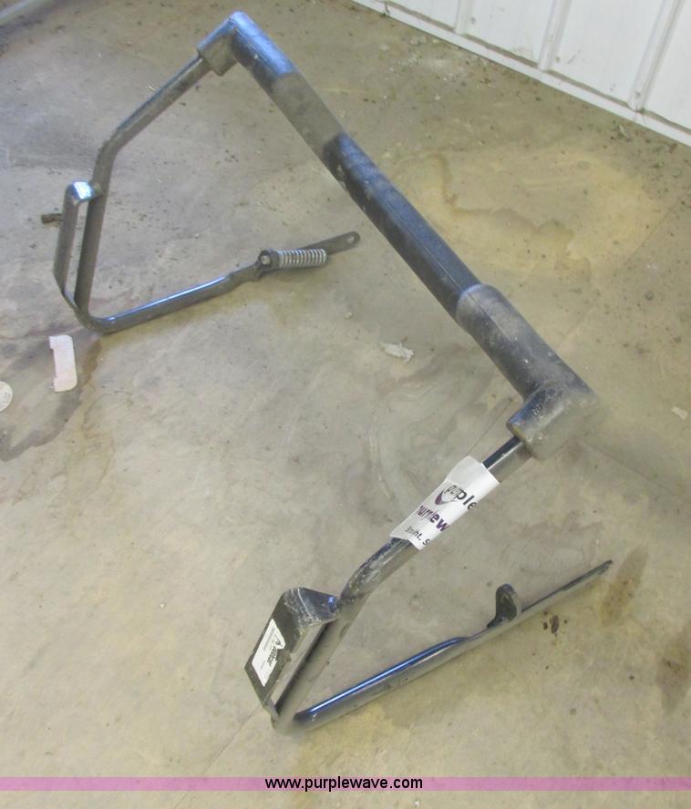 Bobcat seat bar in Norwood, MN Item E5362 sold Purple Wave