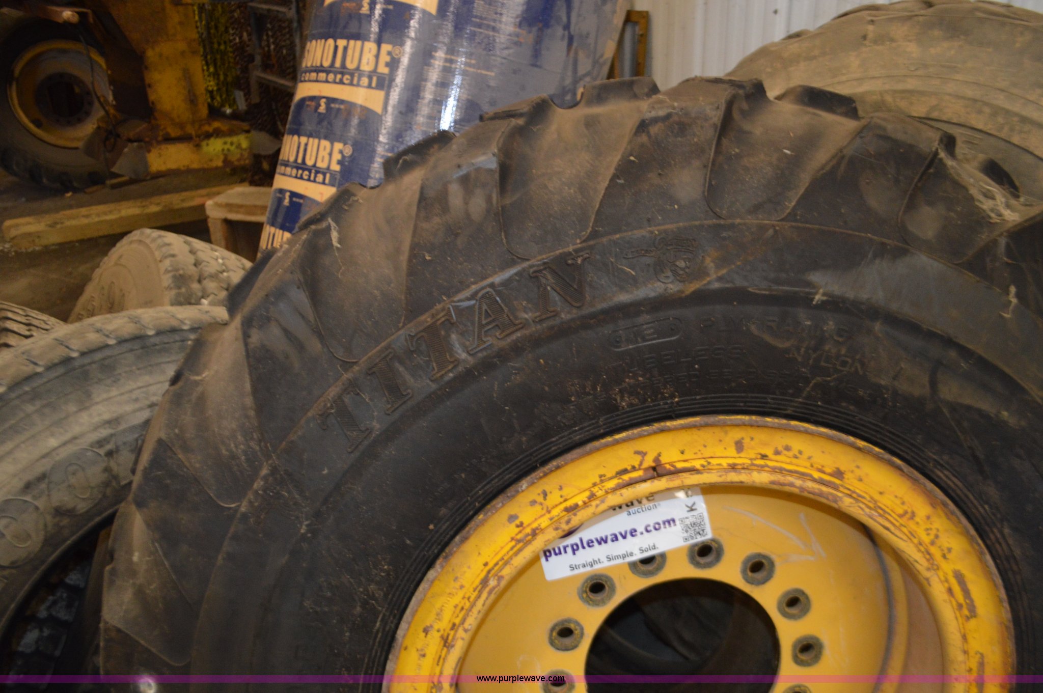 Titan 1424 motor grader tire in Jackson, MO Item K5368 sold Purple