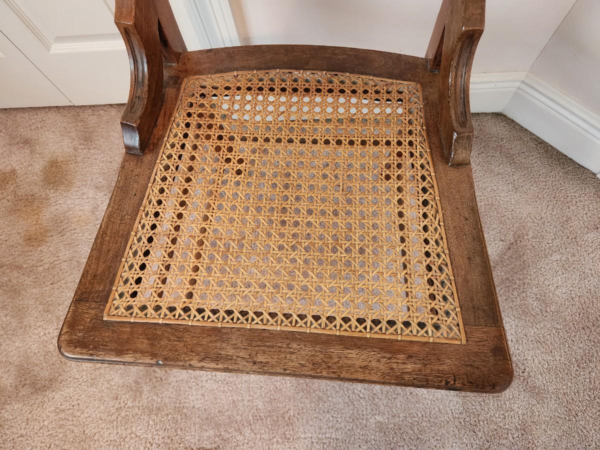 Lot 28 Antique Oak Cane Bottom side Chair