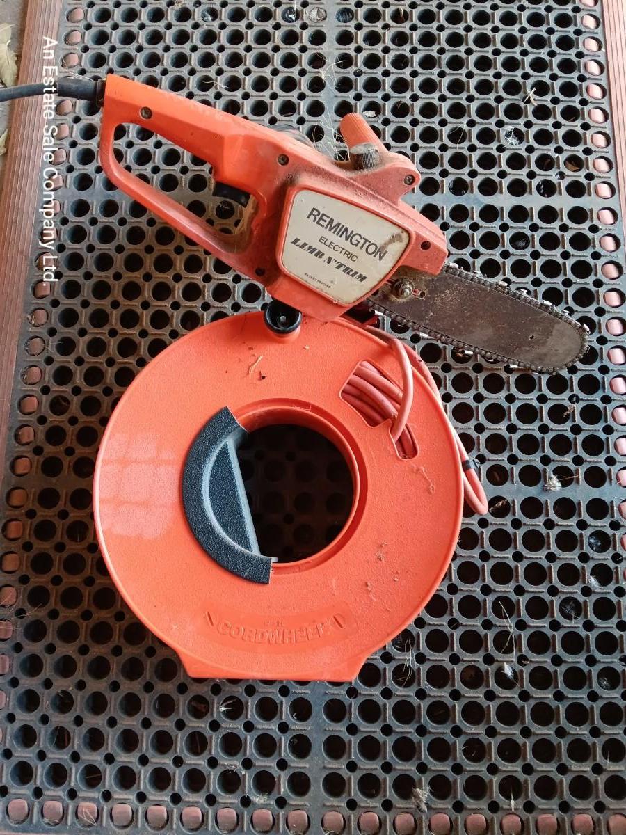 Small Remington Electric Limb n' Trim 8" chain saw with extension cord