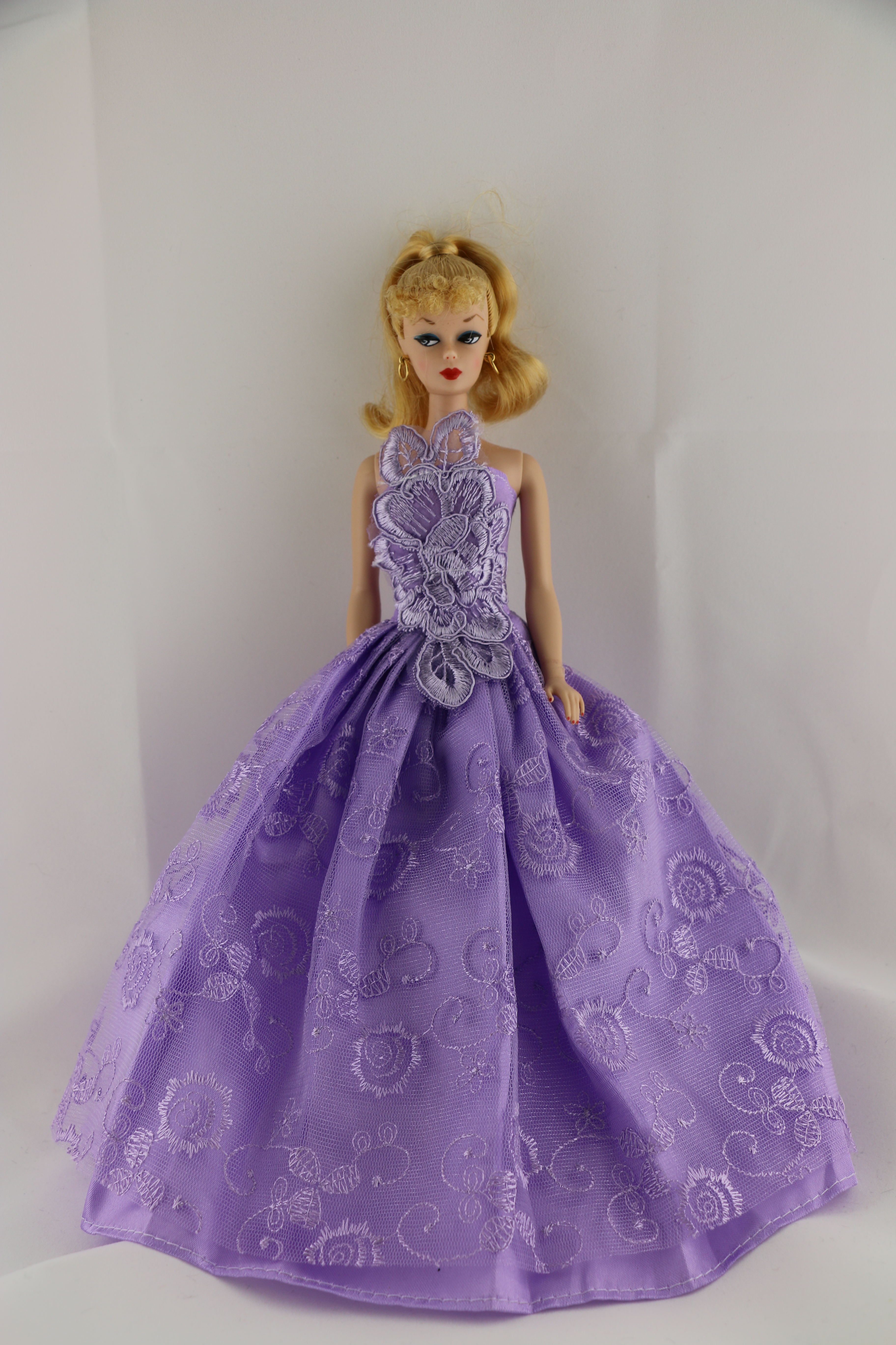 A Little Purple Dress with a Large Floral Botice Made to Fit Barbie