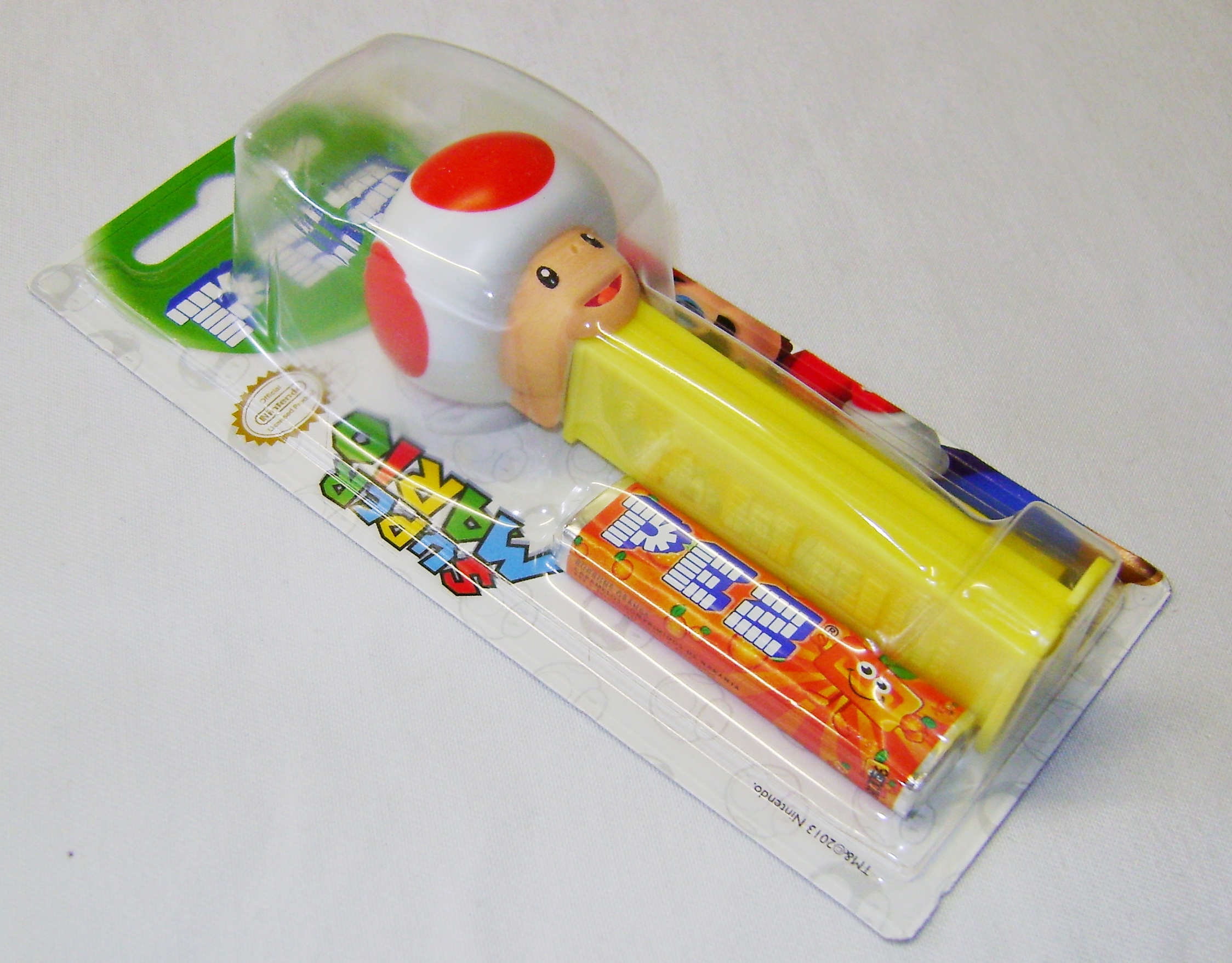 NEW SEALED NINTENDO SUPER MARIO PEZ SWEETS DISPENSER YELLOW TOAD