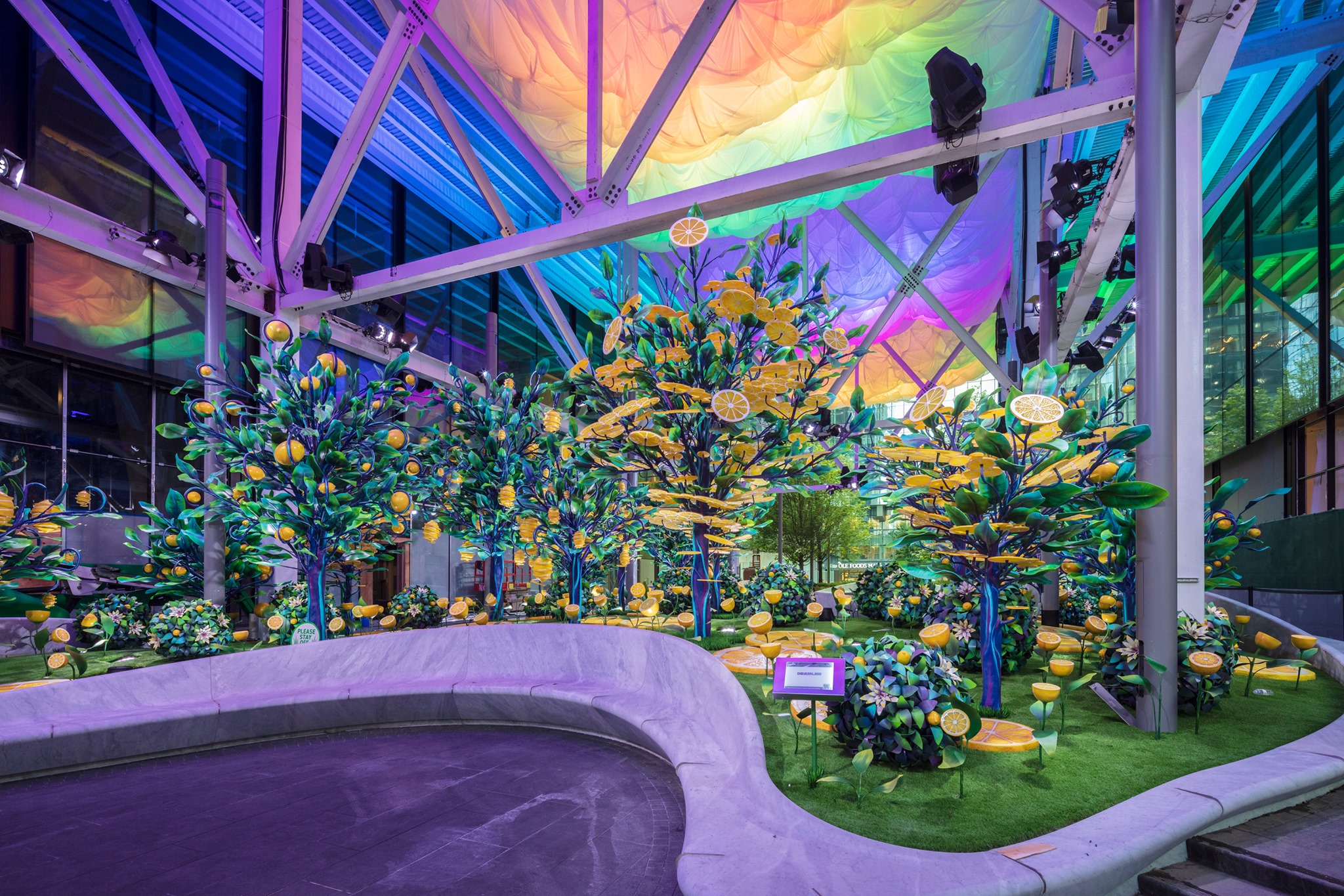 Construction scaffolding reimagined as fantastical lemon grove in