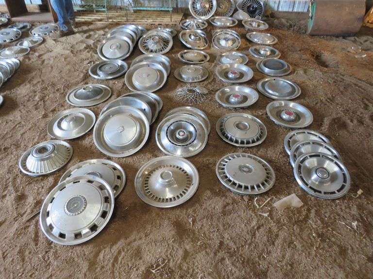 50plus old hubcaps AAA Auction and Realty