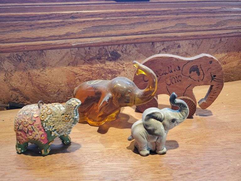 Kanawha solid glass elephant & other wood/plastic elephants Bid