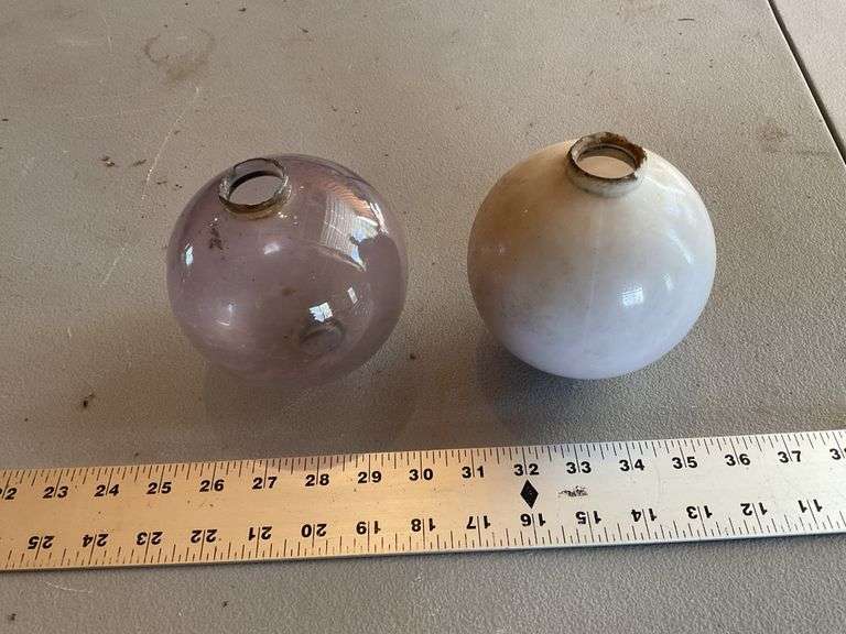 Vintage white and purple weathervane globes Legacy Auction Company