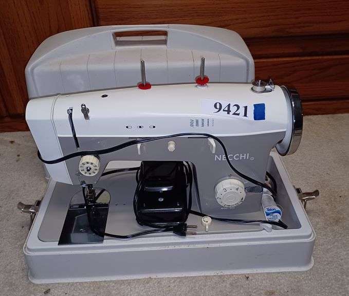 Necchi sewing machine in case Mark Van Hook, Auctioneer