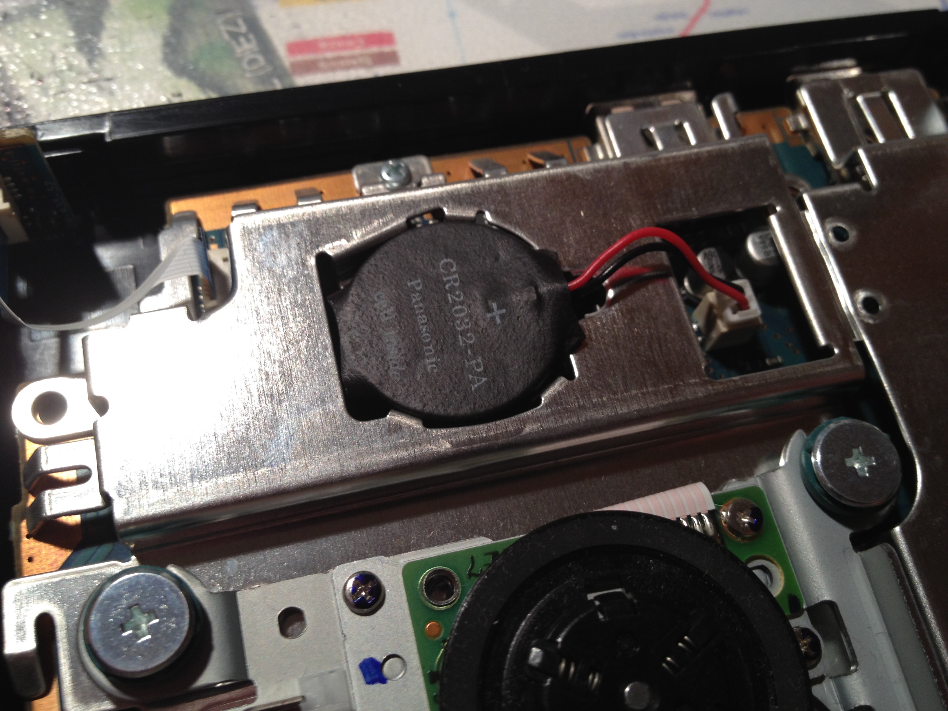 PlayStation 2 Slimline CMOS Battery Replacement iFixit Repair Guide