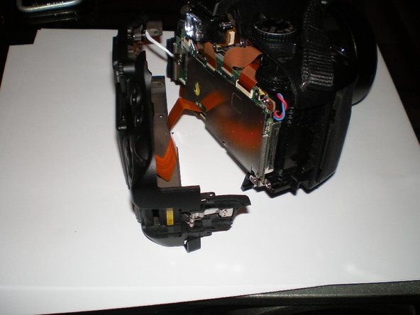 Nikon D5100/D3100 SD Memory Card Door Replacement - iFixit Repair Guide