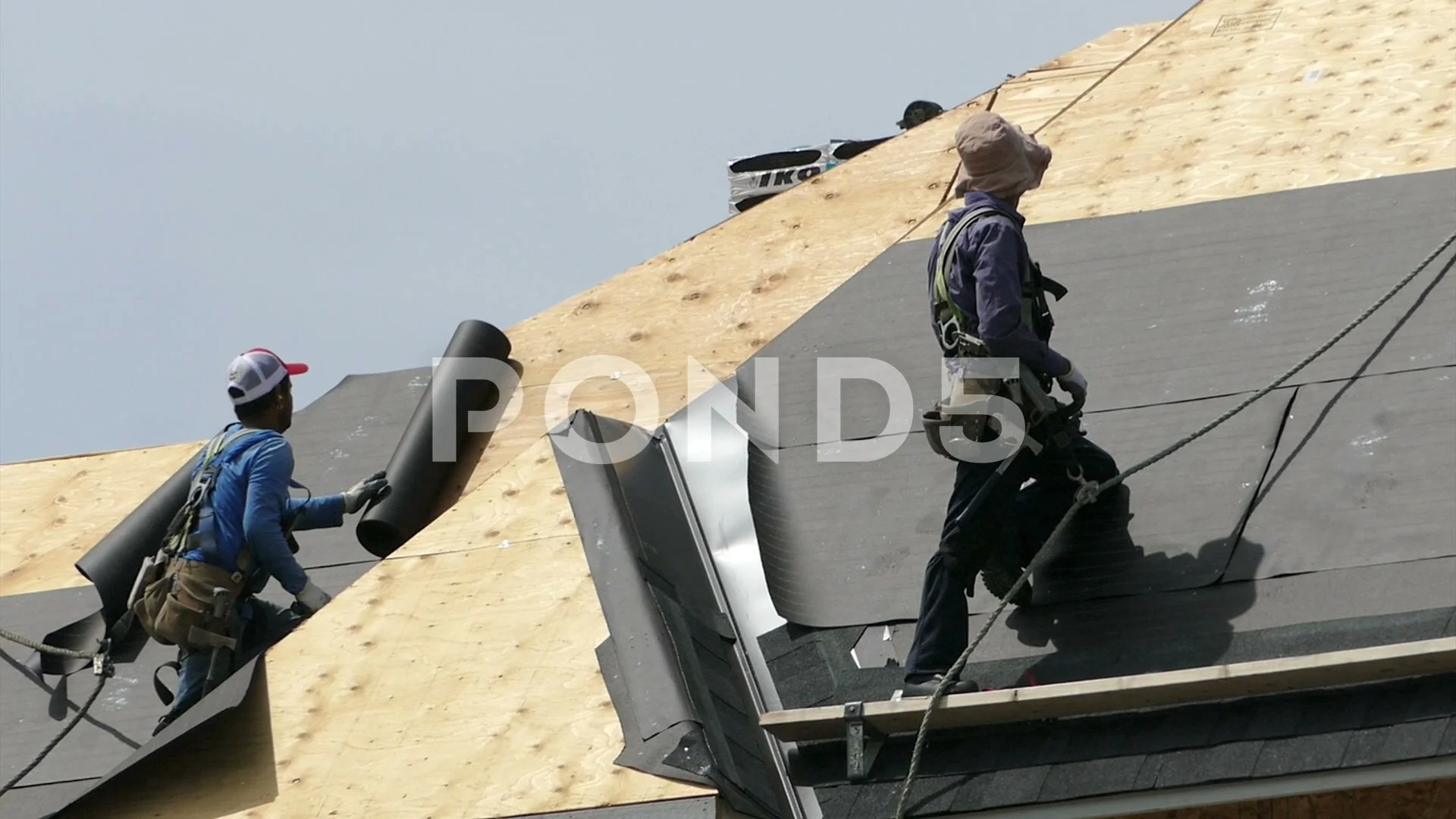 Roofers Hammer Down Tar Paper Rolls Fusion Footage