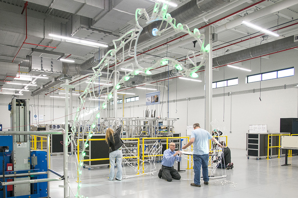 KCC students, staff volunteers refresh Binder Park Zoo's ZooLights