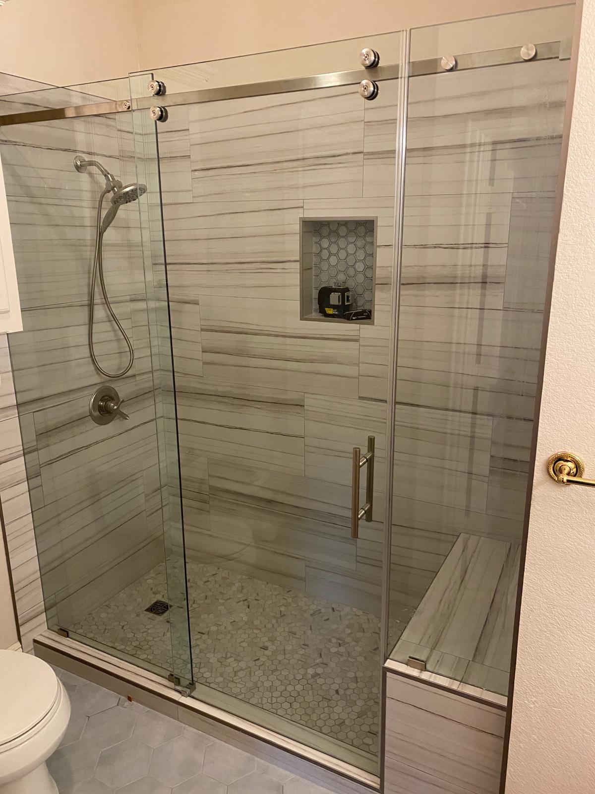 Add Clarity and Openness to Your Bathroom with a Frameless Shower Door