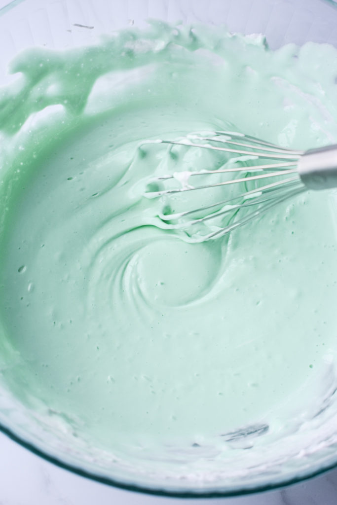melted marshmallows and creme de menthe whisked together