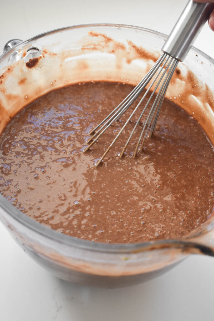 Chocolate Cake Batter in a clear bowl.