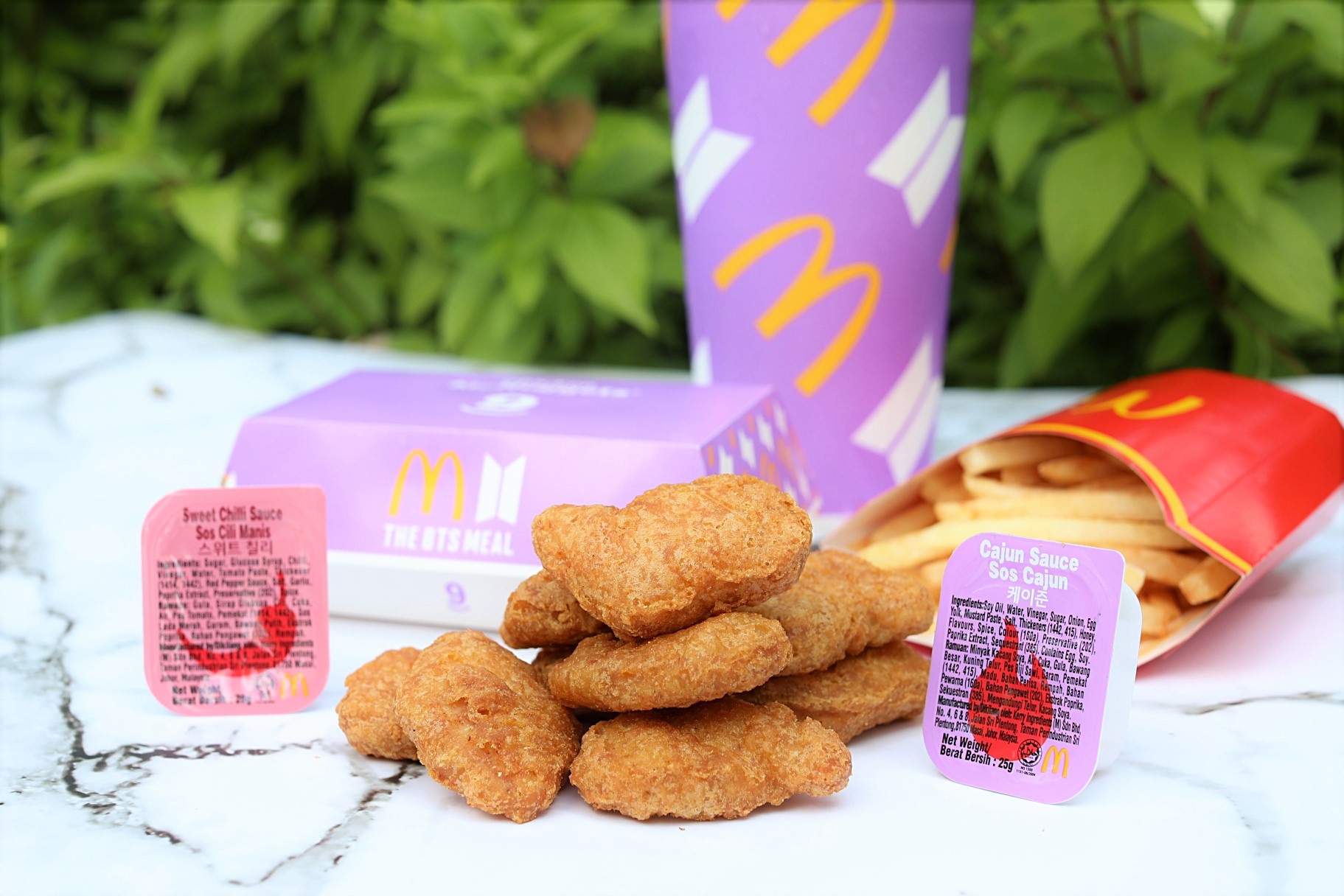 The McDonald’s BTS Meal With Chicken Nuggets And 2 Special Sauces. Here