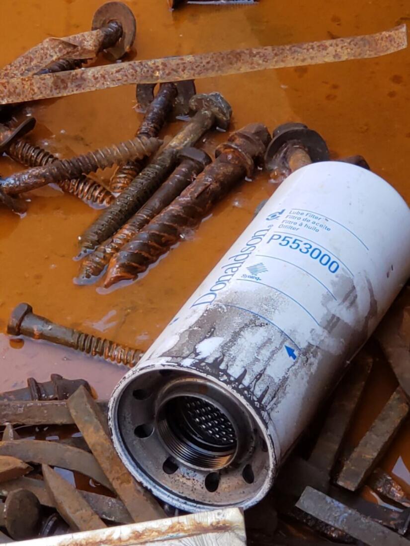 Used Oil Filter in Skip Bin Daniels Training Services