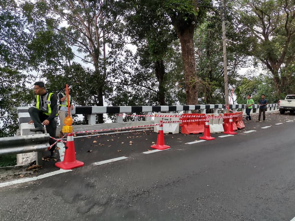 Kerja pembaikan cerun yang telah dijalankan, bukan