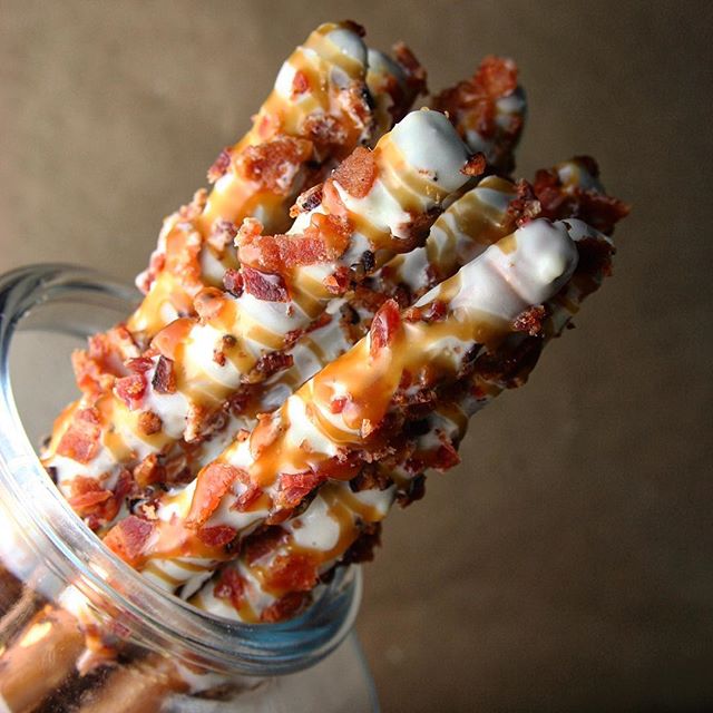 White Chocolate Dipped Pretzel Rods With Cinnamon Sugar Bacon Bits by