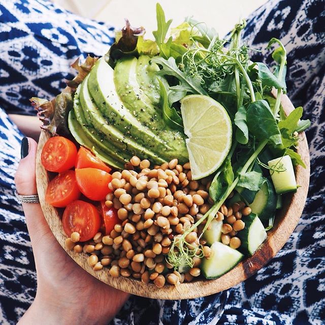 Brown Rice Salad Bowl With Cucumber, Avocado, Cherry Tomatoes, Red